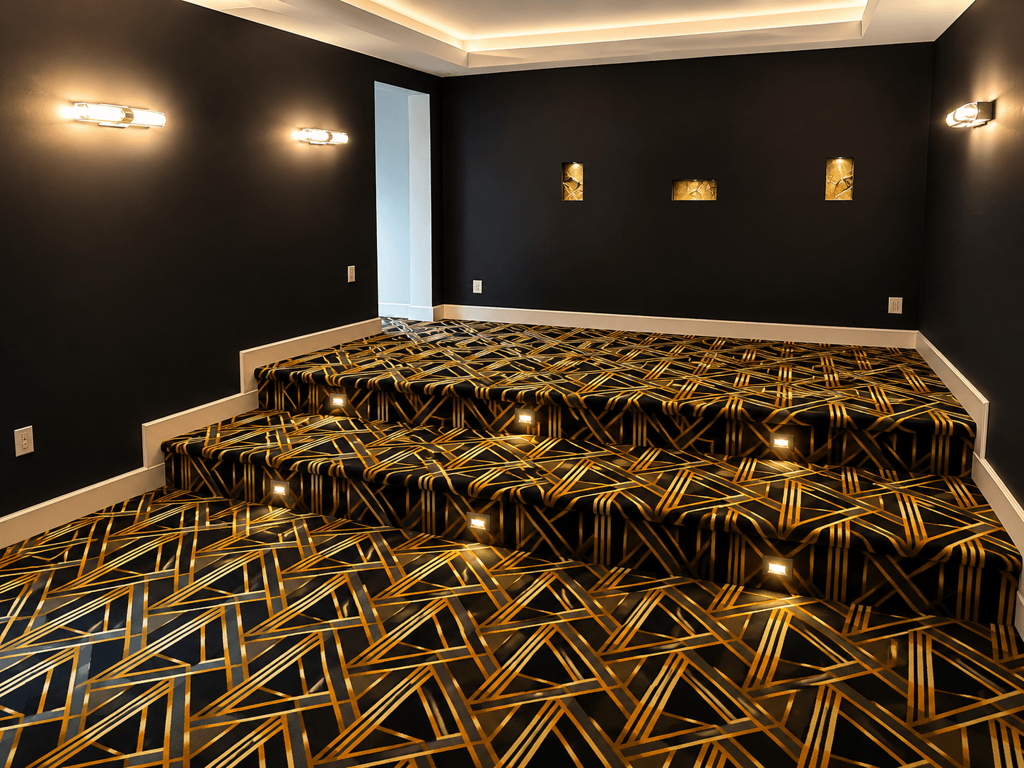 Patterned carpet installation in a finished room with dark walls